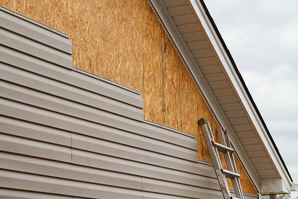 Professional Vinyl Siding technician working in Dysart, PA